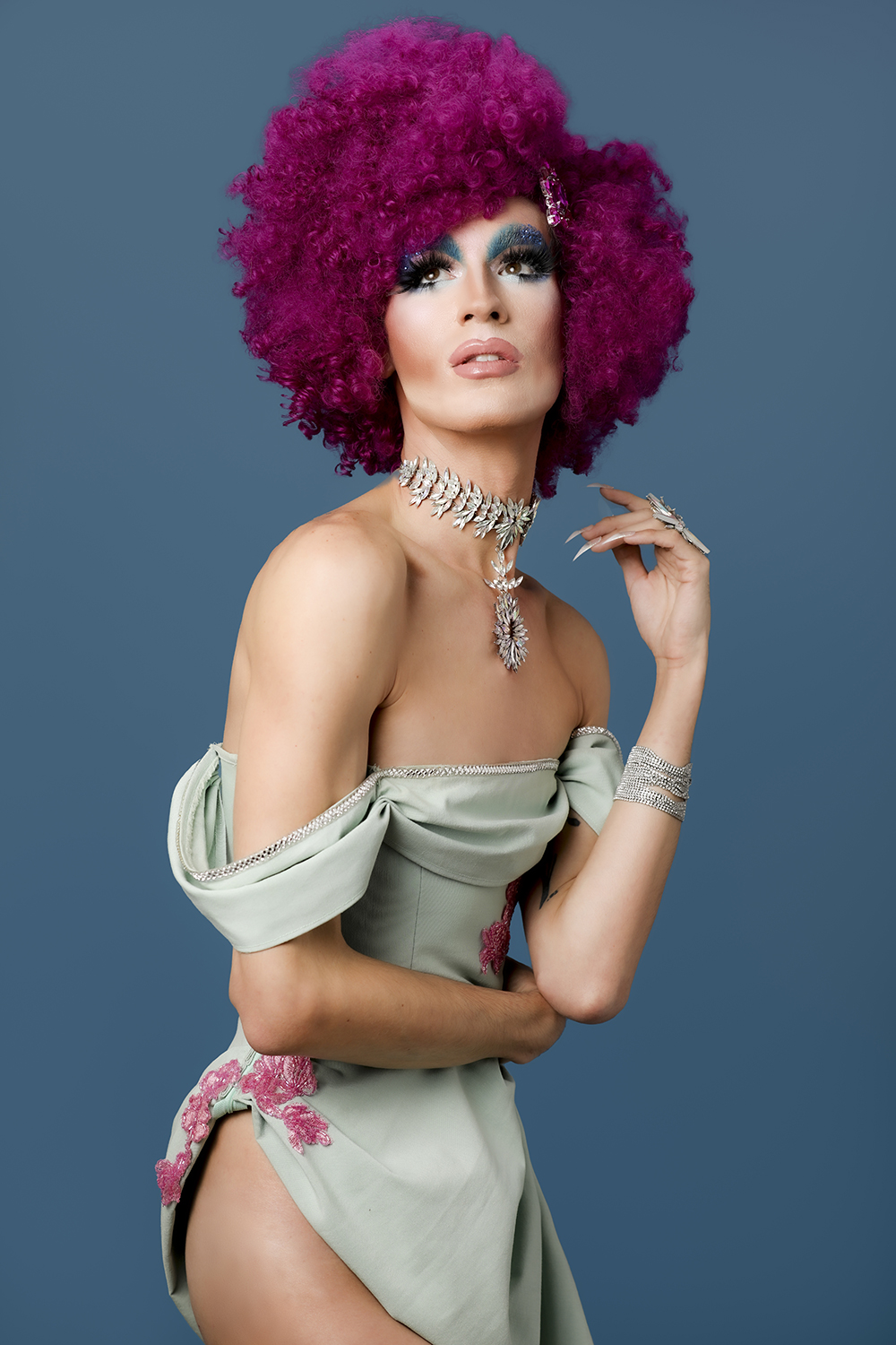 Four drag queens dressed in drag